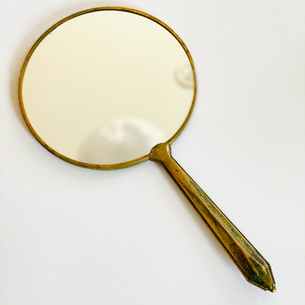 Antique brass vanity mirror